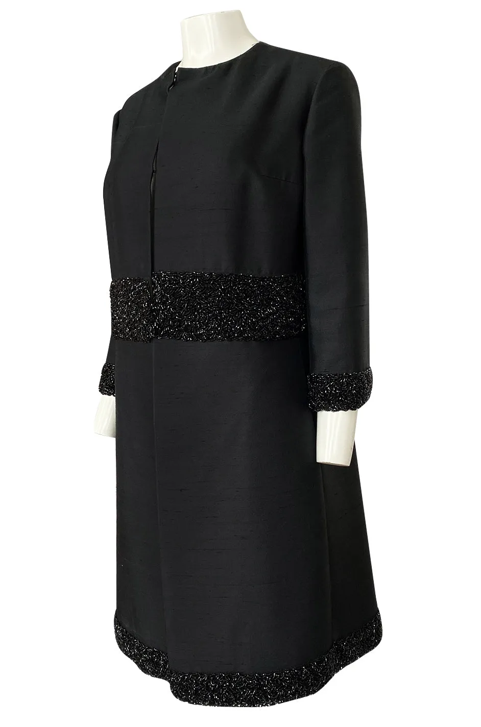 1950s Black Silk Evening Coat w Heavy Beading at the Hem, Cuffs & Waist