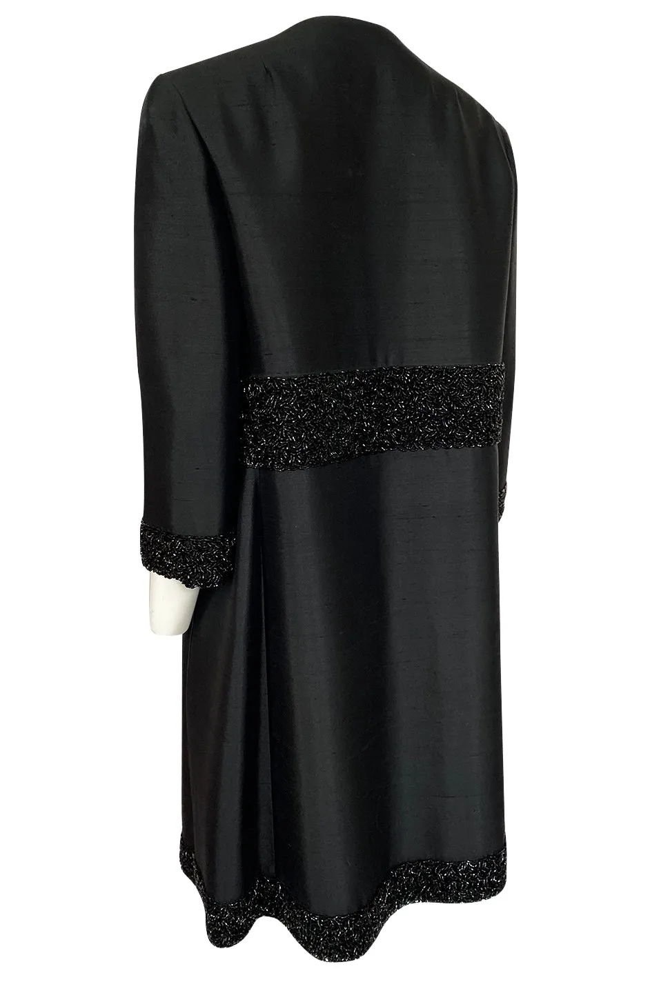 1950s Black Silk Evening Coat w Heavy Beading at the Hem, Cuffs & Waist