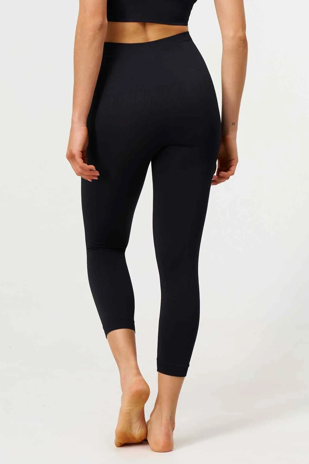 Flow Legging Capri en Negro